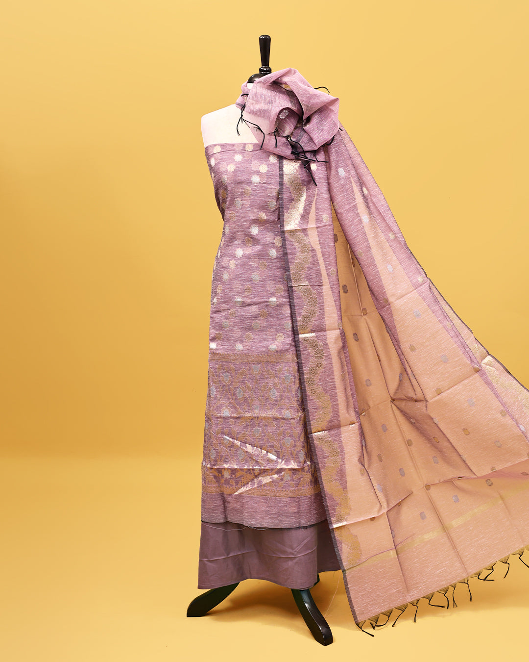 Lavender colour Tissue Salwar material with gold zari floral kodi pattern work on body, matching bottom & Dupatta.