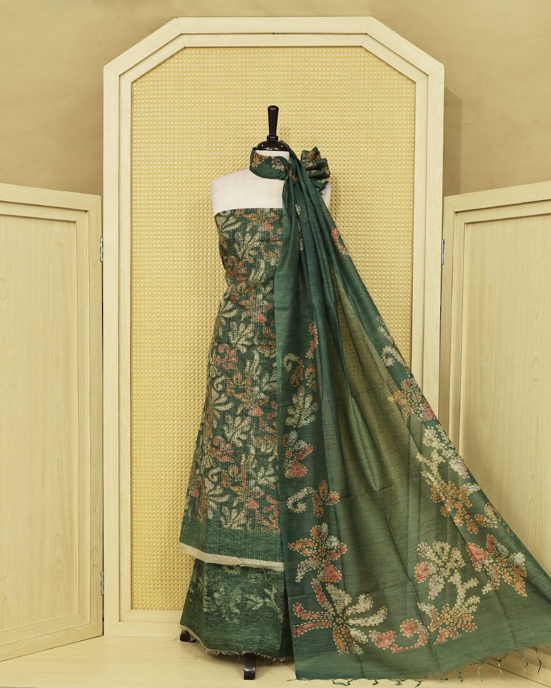 Dark Green colour organza Salwar Material featuring with floral printed kurta, matching bottom, and floral border dupatta.