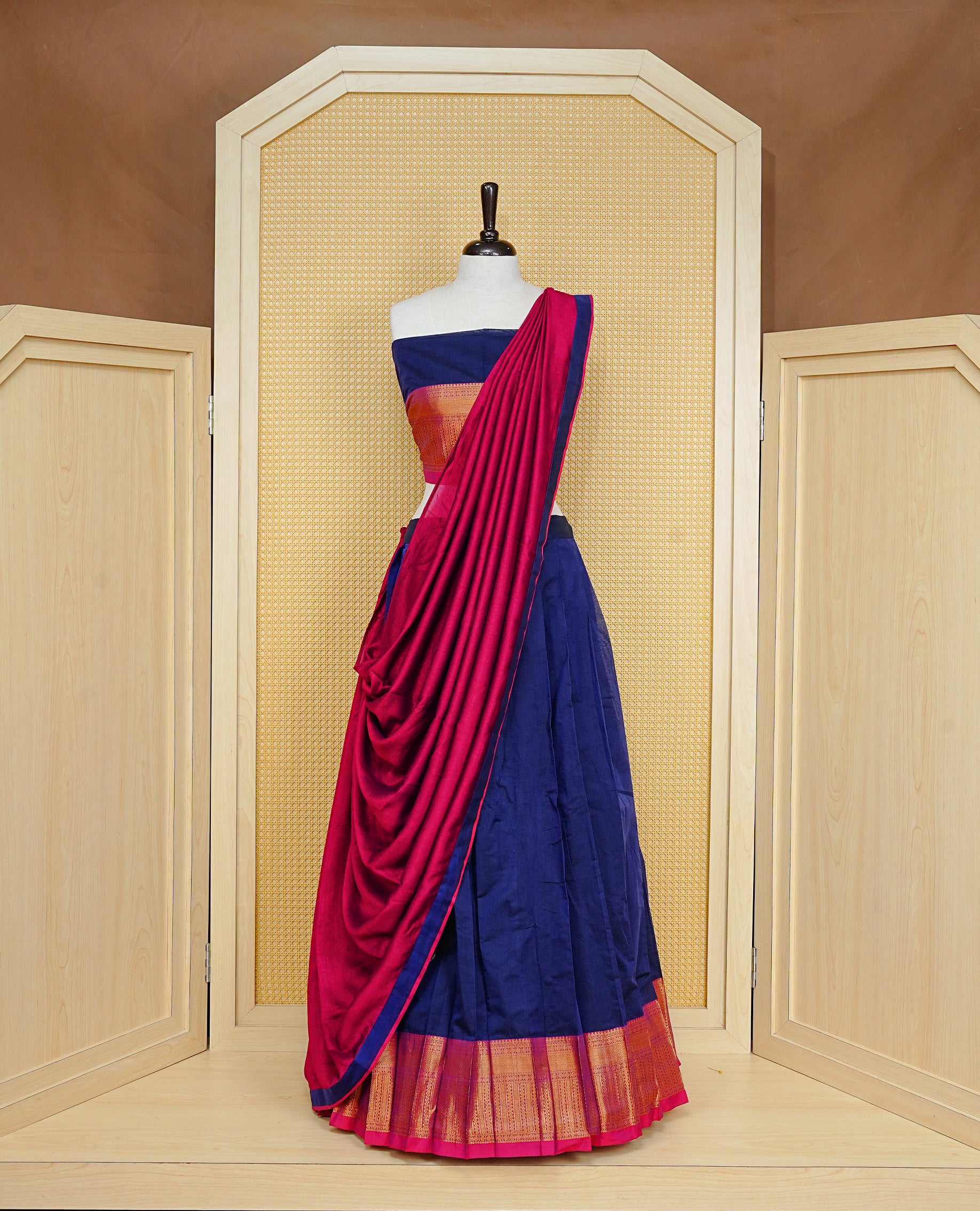 Blue colour Semi Stitched Dhavni set Featuring Blue Skirt With Contrast Maroon colour with Zari border, paired with UnStitched Blouse & Elegant Dupatta.