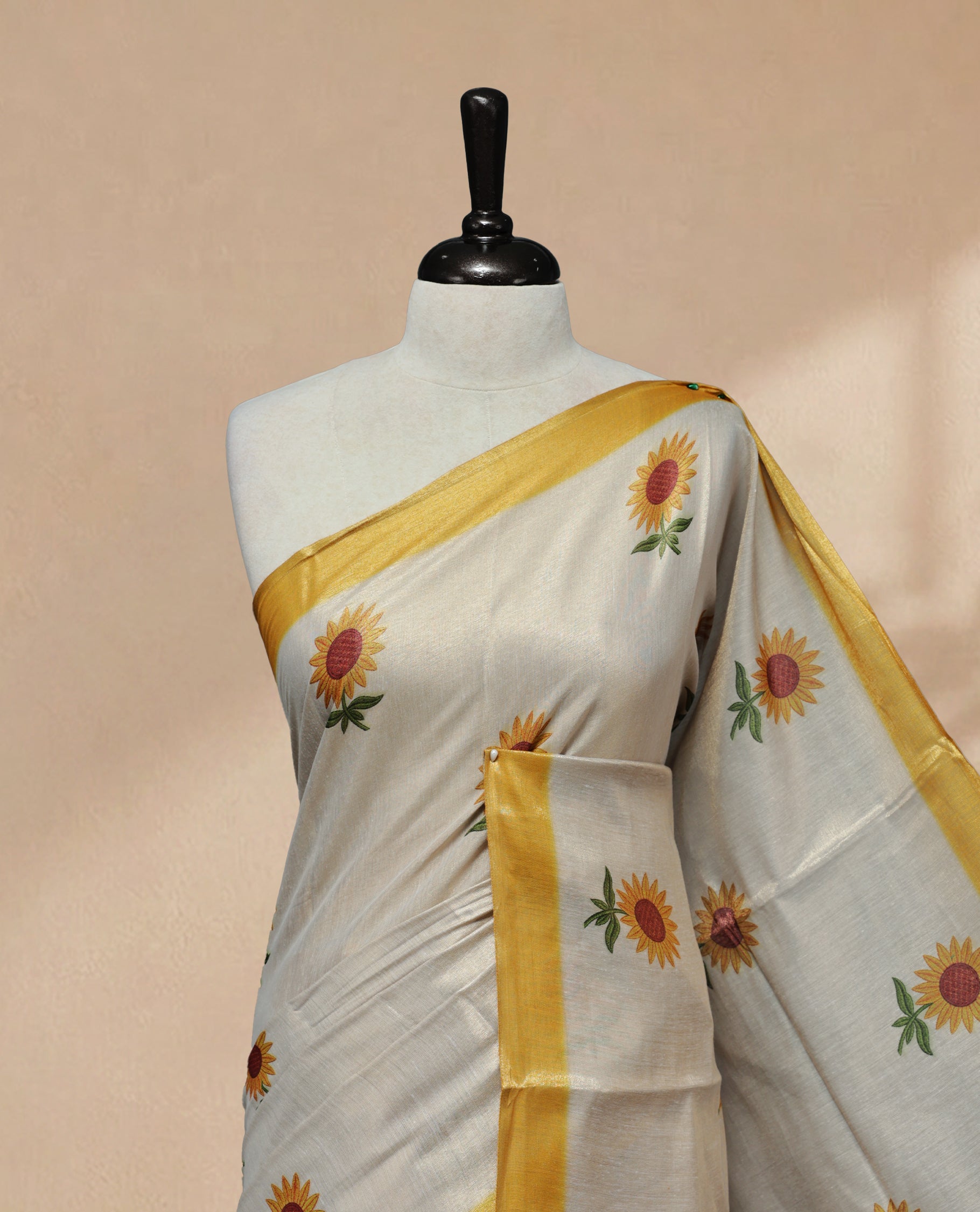 Butter Cream colour Linen Tissue Saree featuring Sunflower Print, small & Big floral print & contrast border, Comes with Contrast Self Printed Blouse.