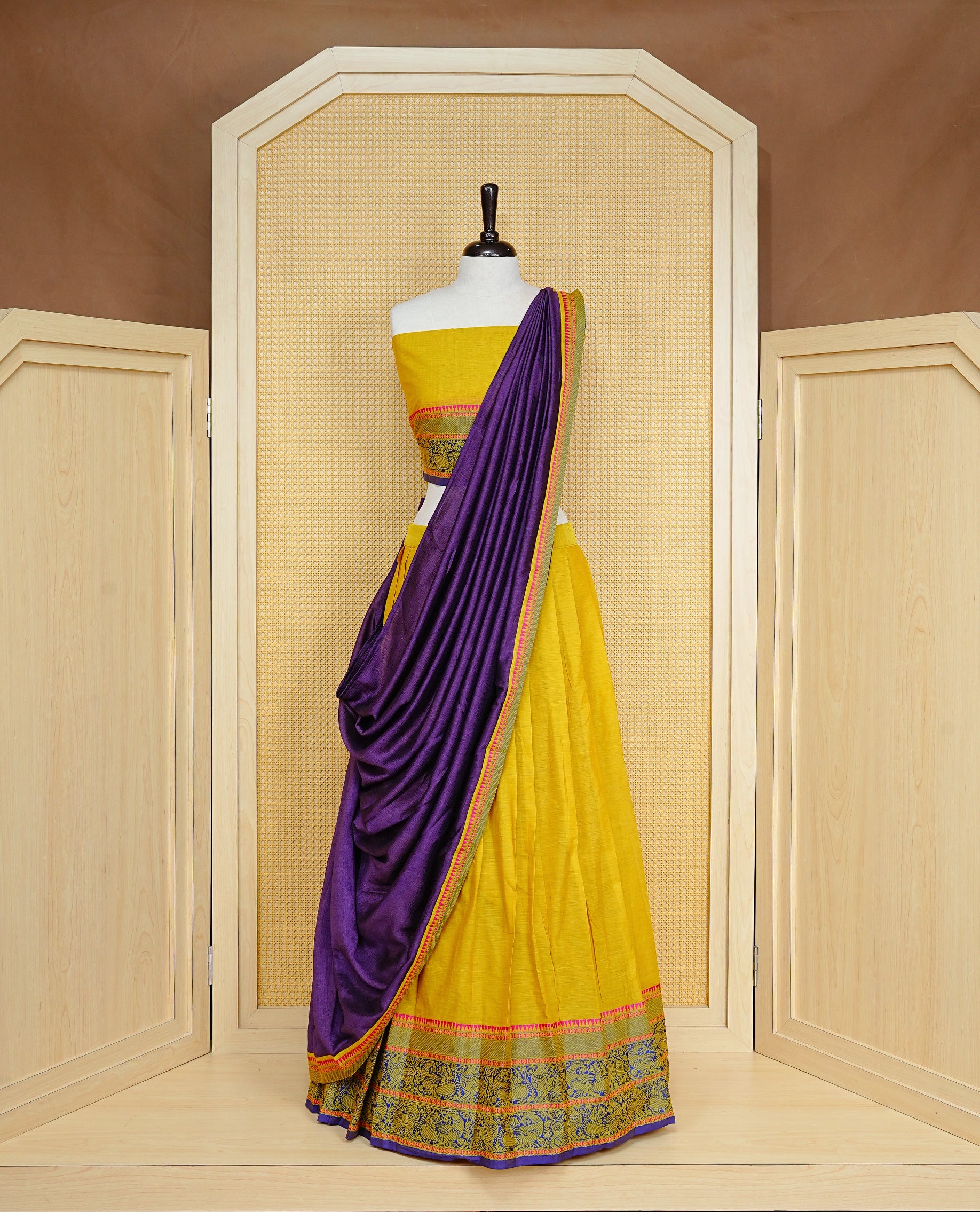 Olive colour Dhavani set Featuring Mustard Skirt and Contrast Blue colour with Zari border, paired with UnStitched Blouse & Elegant Dupatta.
