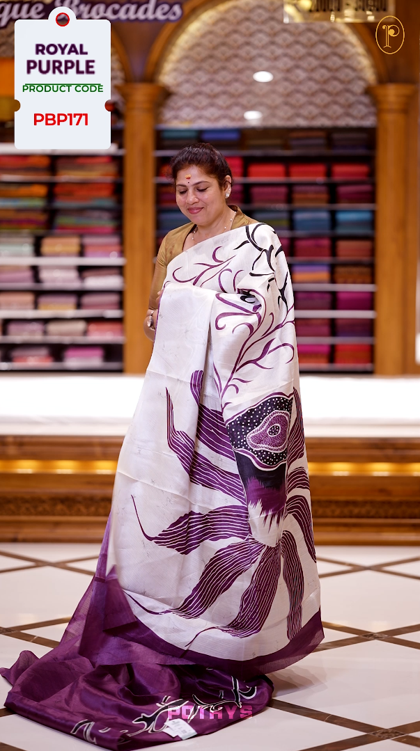 Dark onion pink colour saree adorned with bold off white floral prints, blending tradition with a modern twist & paired with a matching blouse.