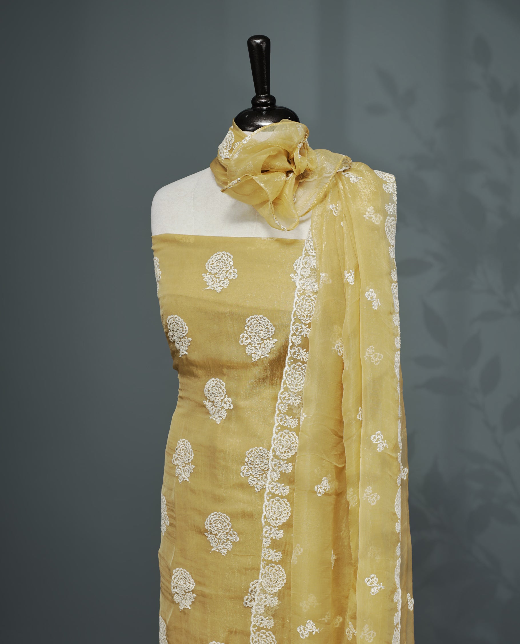 Golden Colour Organza Salwar material Featuring White Embroidery Work On body & Matching Organza Dupatta with Same work & Scallop border, matching bottom.