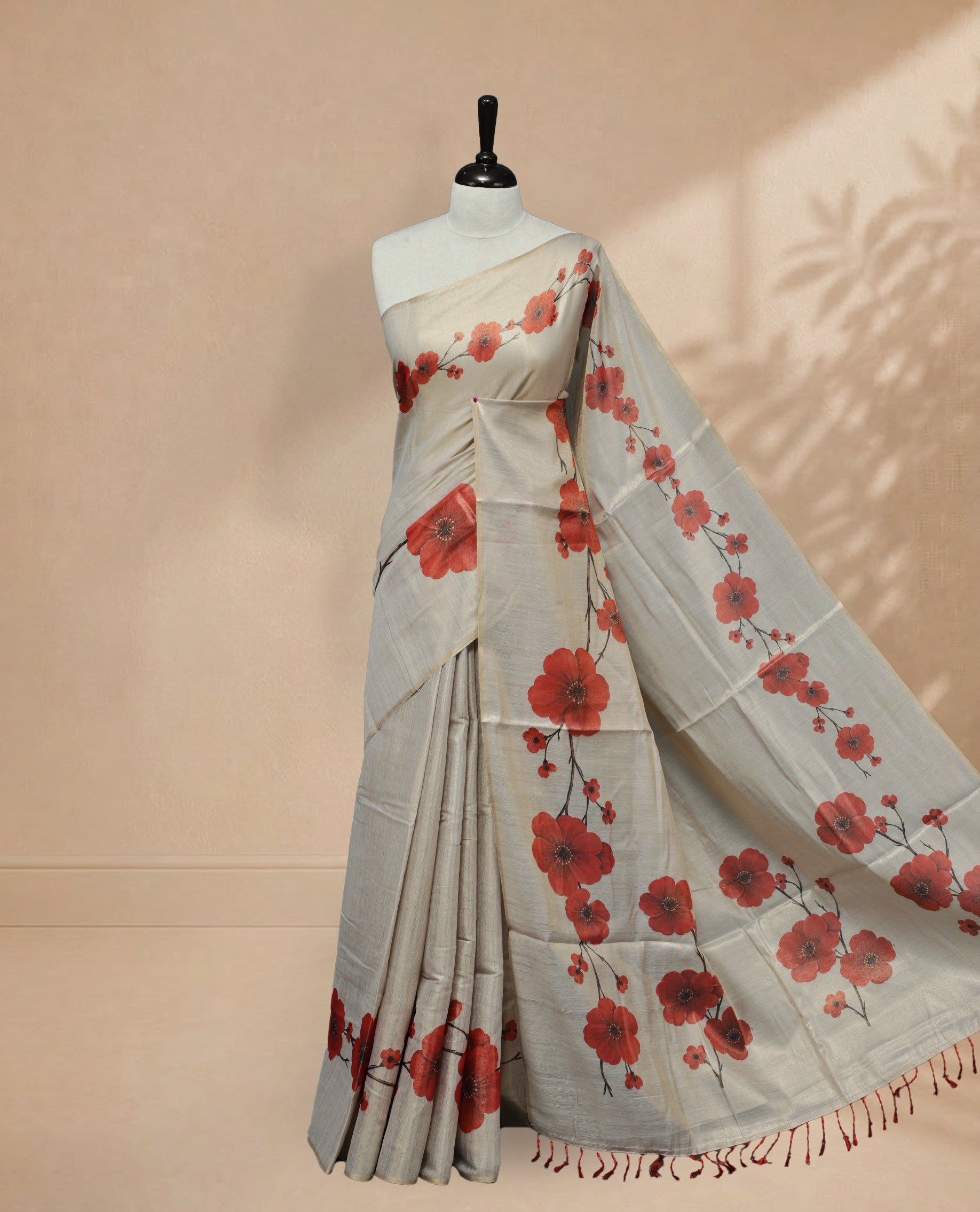 Butter Cream colour Linen Tissue Saree featuring Red colour small & Big floral printed border, Comes with Contrast Self Printed Blouse.