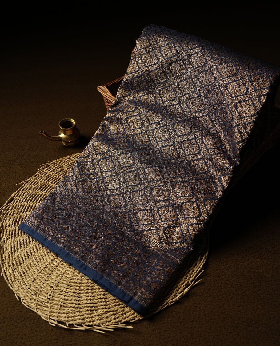 Blue Colour Semi Banarasi Katan Silk Saree with Gold Zari Buti Motifs, Traditional Gold Floral Pallu, Elaborate Woven Border, Decorative Tassels with Matching Blouse