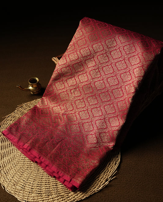 Maroon Colour Semi Banarasi Katan Silk Saree with Gold Zari Buti Motifs, Traditional Gold Floral Pallu, Elaborate Woven Border, Decorative Tassels with Matching Blouse