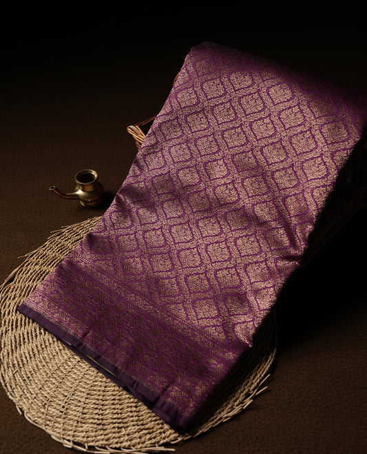 Deep Purple Colour Semi Banarasi Katan Silk Saree with Gold Zari Buti Motifs, Traditional Gold Floral Pallu, Elaborate Woven Border, Decorative Tassels with Matching Blouse