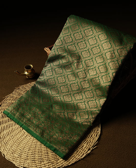 Green Colour Semi Banarasi Katan Silk Saree with Gold Zari Buti Motifs, Traditional Gold Floral Pallu, Elaborate Woven Border, Decorative Tassels with Matching Blouse