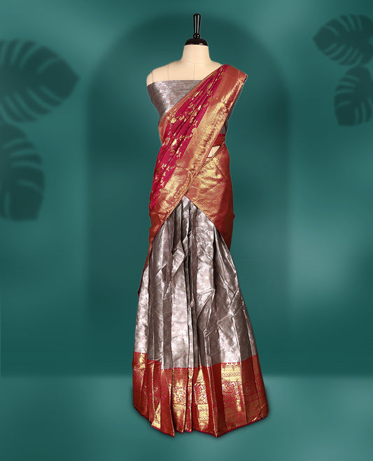 Stunning Semi stitched Rose gold and vibrant majenta Dhavani set featuring a lustrous silver skirt with rich golden zari border, paired with a vibrant majenta dupatta adorned with golden motifs, creating a perfect blend of elegance and tradition.