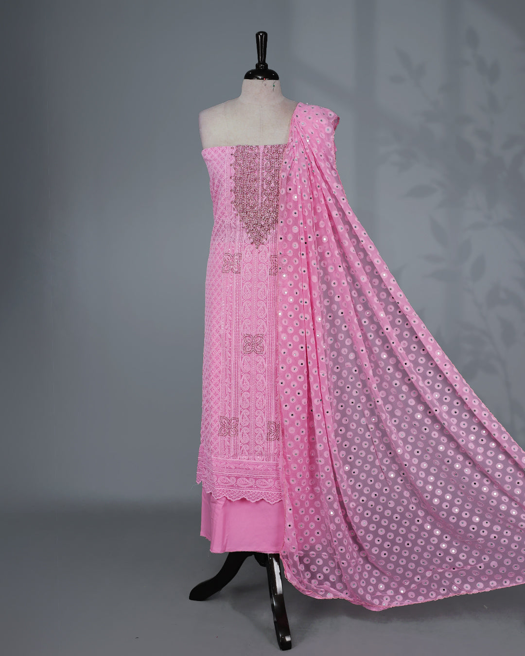 Pink Colour Georgette Salwar Material featuring elegant Chikankari work on the kurta, paired with a matching bottom and a sequins-embellished dupatta.