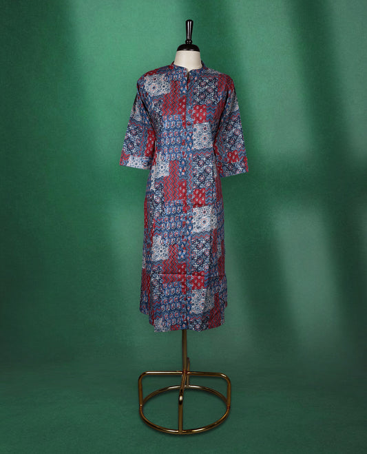 Multicolour colour kurti adorned with vibrant patchwork style prints in shades of red, blue, and white, featuring a mandarin collar, front placket, and three quarter sleeves a bold and comfortable choice for everyday fashion.