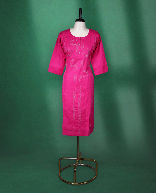 Magenta pink colour cotton kurti featuring delicate embroidery on the front, a round neckline with button detailing, and elbow length sleeves, vibrant and elegant pick for daily wear.