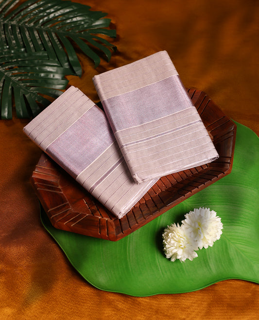 Light Rose Gold colour Tissue SET MUNDU featuring a Striped body, complemented by a Rosegold Zari Bold Border (2.00/2.80 MTS ).