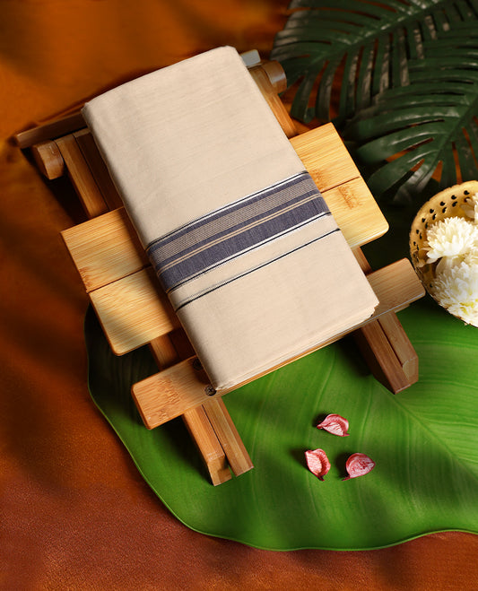 Off white colour pure handloom double dhoti featuring an elegant navy blue kara with golden zari stripes and fine line detailing, woven with precision for comfort and durability, perfect for traditional and festive occasions