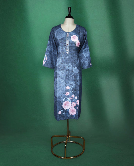 Denim blue straight cut kurti crafted in soft cotton, featuring elegant floral prints in pastel pink, a round neckline with embroidered button placket, and 3/4th sleeves with printed detailing perfect for casual and semi formal wear