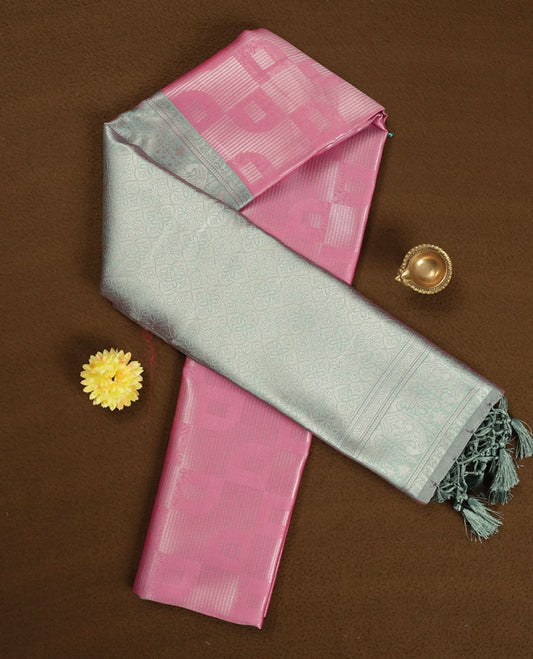 Baby Pink colour Semi Silk Saree with Self-Checked Geometric Patterns, Contrasting Silver Zari Woven Pallu and Border with Intricate Motifs and Tassels, Paired with Coordinated Blouse Piece