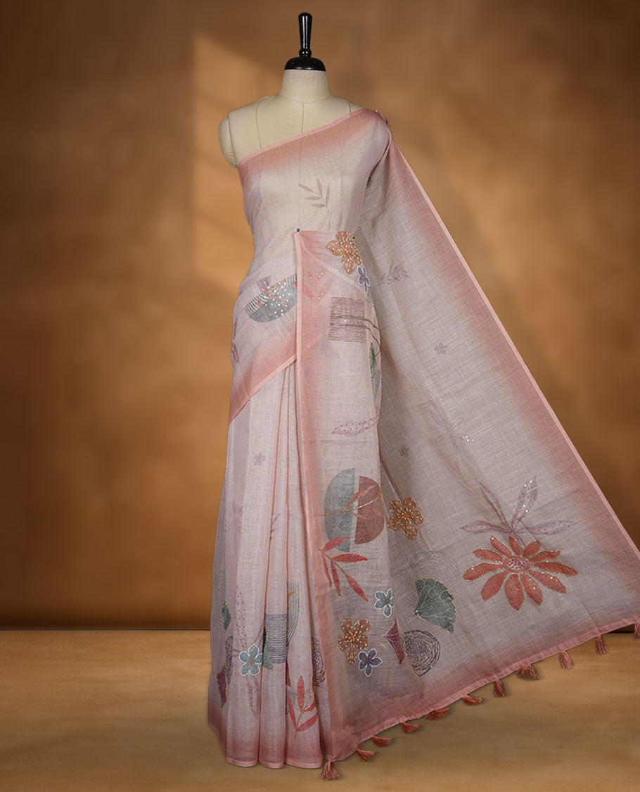 Light peach colour Linen saree featuring Peach colour fade border with floral beats pattern around floral print across body without border, pallu and matching blouse piece.