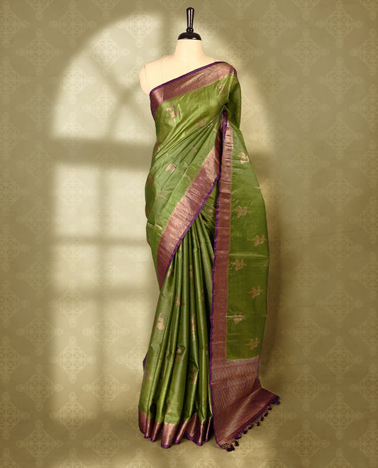 Deep olive colour pure Banaras tussar silk saree with light gold zari traditional motifs on body, contrast wine border featuring copper and silver antique zari traditional work, antique zari traditioal pallu, with matching blouse.