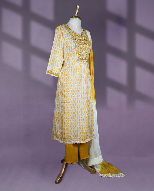 Vibrant yellow and white colour salwar set with bottom, featuring a round neckline with detailed yoke embroidery, three-quarter sleeves, and a beautifully ombre dyed dupatta with gold motifs