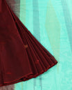 Maroon colour Silk Cotton saree featuring intricate zari woven Motifs across the body, paired with a thin border & Contrast Colour Pallu ,with matching blouse