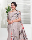 Pastel Onion colour Semi linen saree featuring vibrant multicolour floral digital prints on body and pallu, paired with a matching blouse.