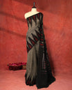 Steel Grey and black colour Ikkat Pochampally saree featuring maroon & black abstract ikkat patterns on the body, traditional geometric ikkat design on the pallu, without Blouse