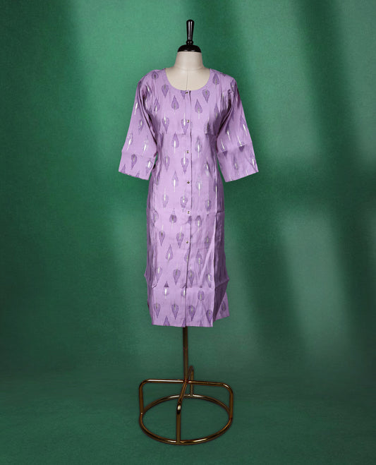 Lavender colour cotton kurti adorned with metallic silver leaf motifs, featuring a round neckline, front button placket, and elbow length sleeves a perfect blend of subtle shine and everyday comfort.