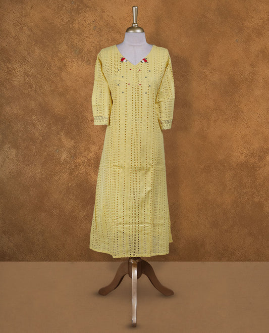 Yellow colour kurti with self colour colour thread pattern across the body, knee length design, styled with a V neckline and a  sleeve .