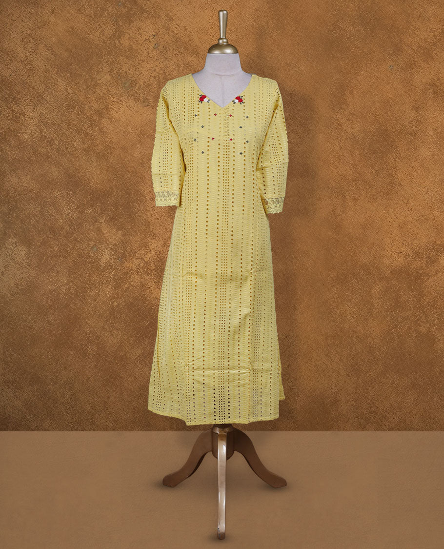 Yellow colour kurti with self colour colour thread pattern across the body, knee length design, styled with a V neckline and a  sleeve .