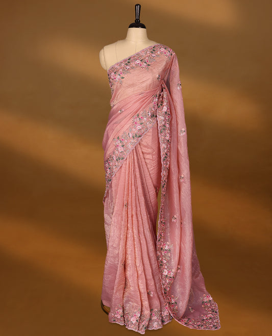 Pastel Pink Crush Soft Silk saree featuring Floral Thread Works on the body, complemented by delicate floral embroidery border and a matching  blouse.