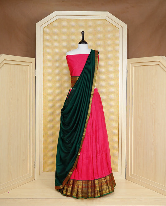 Red colour Semi Stitched Dhavni set Featuring Red Skirt With Contrast Green colour with Zari border, paired with UnStitched Blouse & Elegant Dupatta.