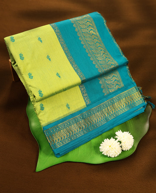 Lemon Green colour mixed Kalyani cotton saree featuring Contrast zari motifs throughout the body, paired with a Bluish Green colour traditional border and pallu, with matching blouse