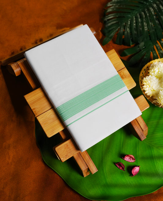 White colour cotton dhoti with a soothing green border, Lightweight, soft, and ideal for daily wear, temple visits, or traditional events & A simple yet graceful choice for a refined ethnic look.