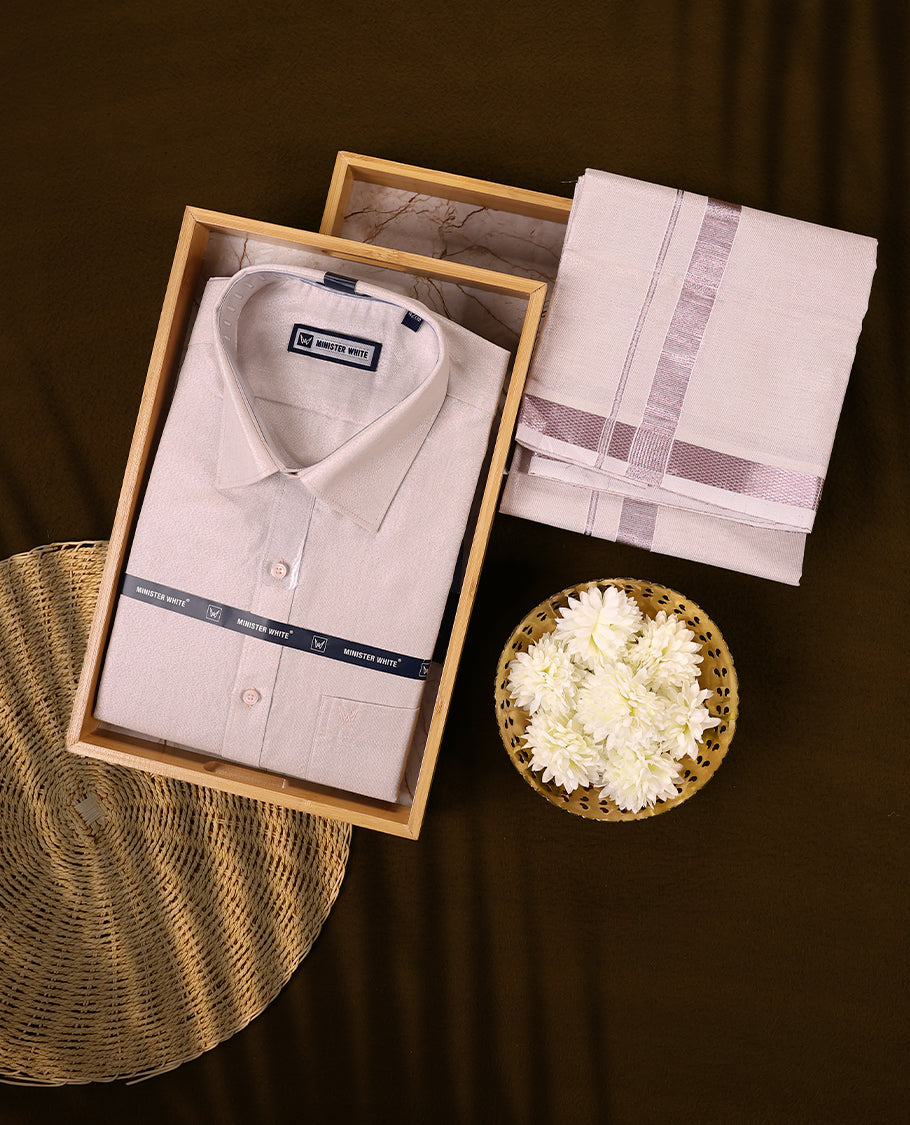 Elegant light pink tissue shirt and matching dhoti set with a refined texture and subtle sheen featuring a pink tissue zari border ideal for festive and formal occasions