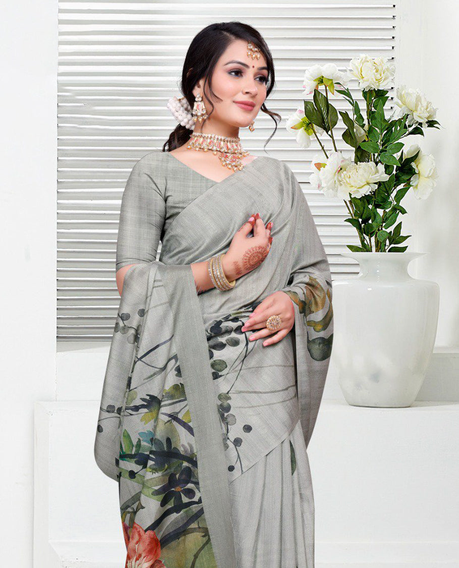 Grey colour Semi linen saree featuring vibrant multicolour floral digital prints on body and pallu, paired with a matching blouse.