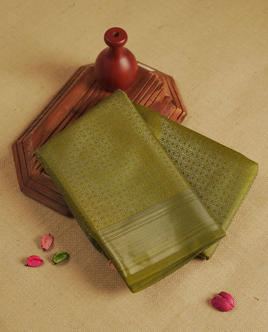Olive colour semi silk saree featuring neem zari Brocade geometric Pattern all over the body, complemented by a Self Colour woven border with detailing, Pallu & blouse.
