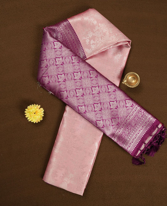 Blush Pink colour Semi Silk Saree with Allover Subtle Floral Self-Weave on the Body, Contrasting Plum Purple Zari Woven Pallu and Border Featuring Intricate Geometric Motifs and Tassels, Paired with Coordinated Blouse Piece