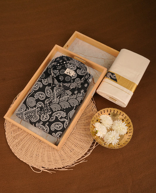 Black colour shirt featuring Floral Pattern printed body, paired with cream colour double dhoti featuring gold zari with same pattern printed border.