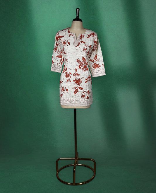 Beige colour short kurti with brown floral prints and intricate border detailing on the hem and sleeves, featuring a V slit round neckline and 3/4th sleeves, perfect for everyday comfort and style.