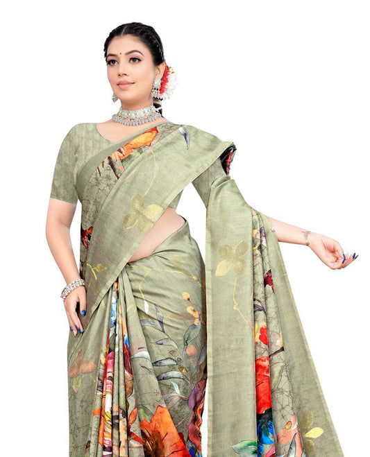 Pastel green Semi linen saree featuring vibrant multicolour floral digital prints on body and pallu, paired with a matching blouse.