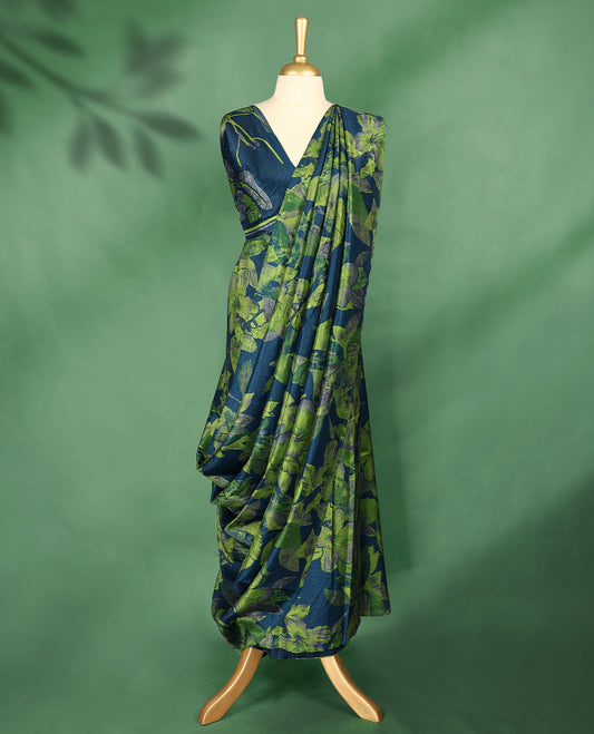 Deep navy colour Manipuri saree featuring oversized lime green and olive floral motifs, finished without a border, and paired with a matching blouse.