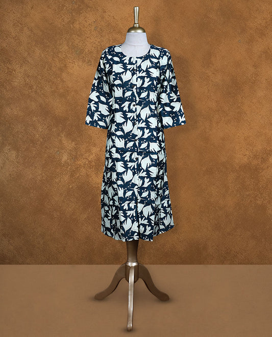 Teal and cream colour kurti with White floral prints, knee length design, styled with a round neckline and a sleeve .