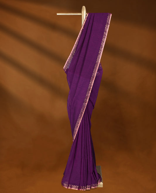 Magenta Purple colour soft khadi cotton saree with plain body, detailed woven Gold zari border, paired pallu with tussles, with matching blouse.