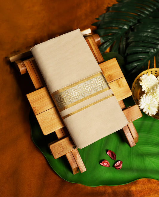 Elegant off white colour pure handloom double cotton dhoti adorned with an intricate golden zari border featuring diamond motifs, crafted for timeless elegance and breathable comfort, perfect for festive and traditional wear.