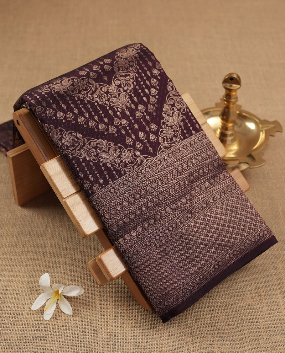 Coffee Brown colour Kanchipuram pattern Manthrakodi saree featuring geometric antique zari jacquard pattern, geometric zari border and zari jaquard blouse piece.