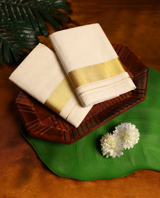 Off white colour cotton SET MUNDU featuring plain body, complemented by a gold zari 2 Inch Bold border( 2.00/2.80 MTS).