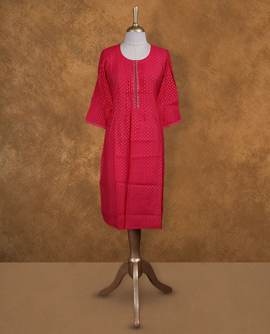 Rose pink colour kurti from TWARA, detailed with gleaming gold polka dots, featuring a scoop neckline with pintucked yoke and embellished placket, finished with relaxed 3/4th sleeves.