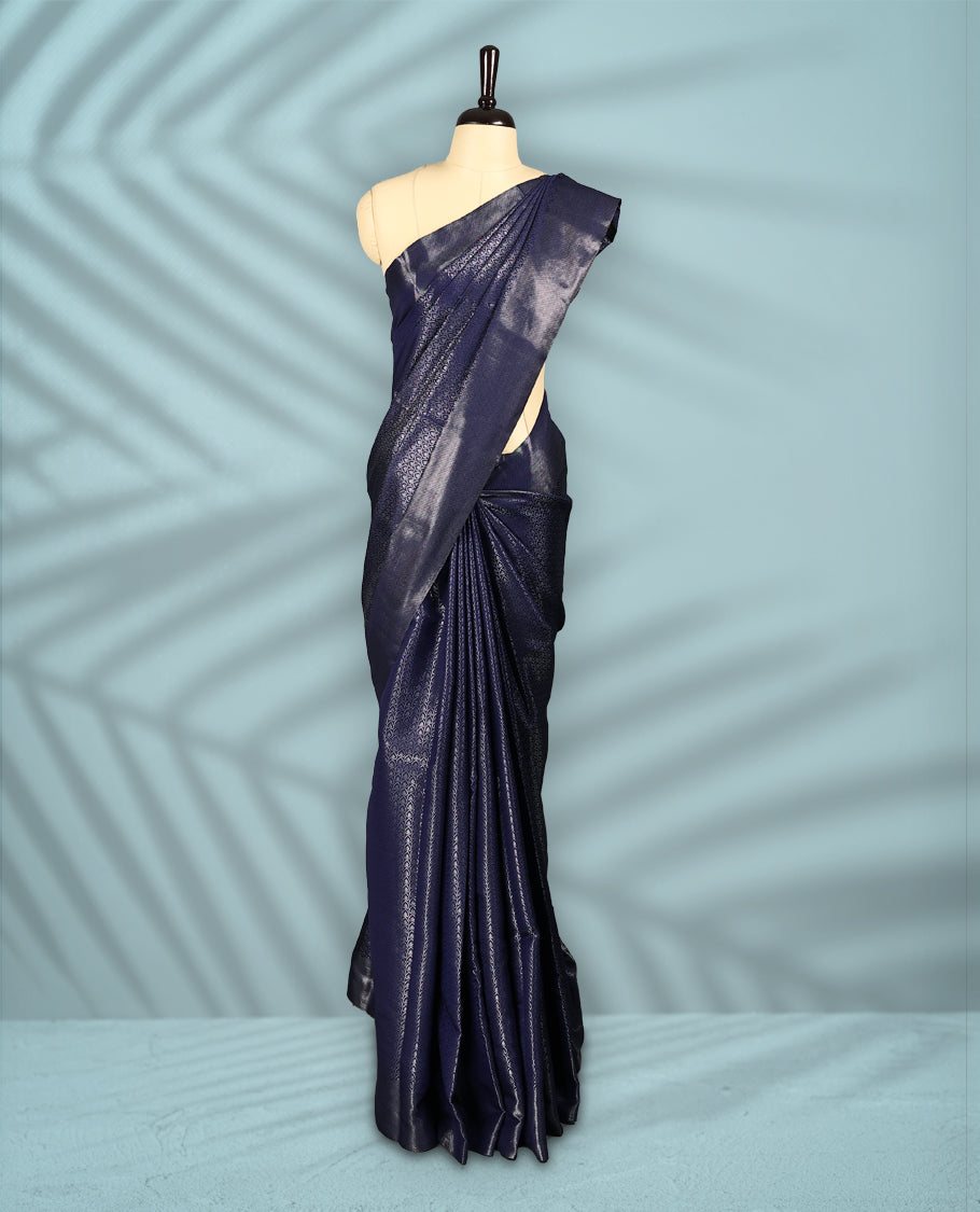 Navy Blue Colour semi silk saree featuring an intricate Zari  motif weave across the body, paired with a zari worked border with matching blouse.
