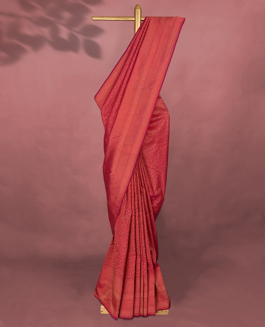 Rani Pink colour Kancheepuram saree featuring an antique zari brocade body, complemented by a traditional border and a matching blouse.