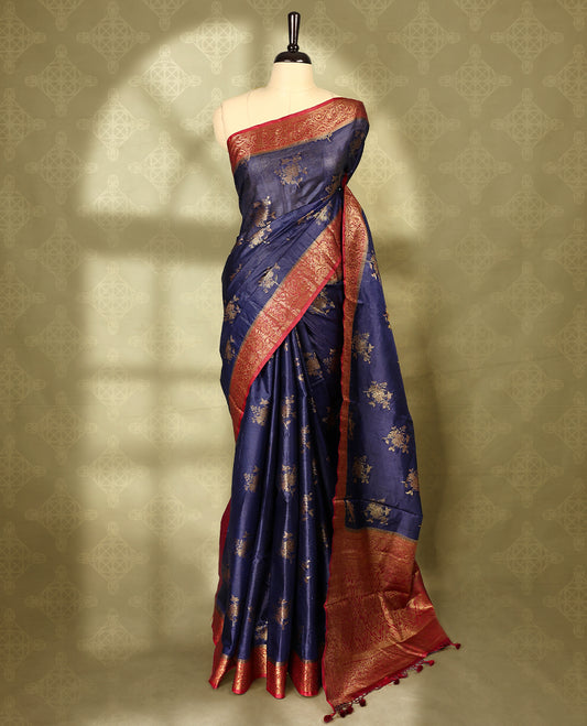 Deep Blue colour pure Banaras tussar silk saree with light gold zari traditional motifs on body, contrast deep red border featuring copper and silver antique zari traditional work, antique zari traditioal pallu, with matching blouse.